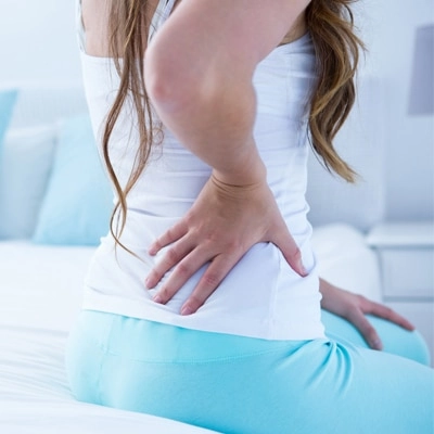 Chiropractic Cedar Park TX Woman With Back Pain