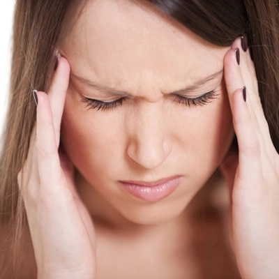 Chiropractic North Austin TX Woman With Migraine